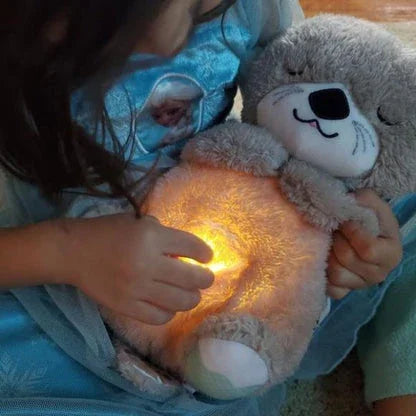 Kind mit leuchtendem Otter Kuscheltier, innovatives Gadget von Morivar